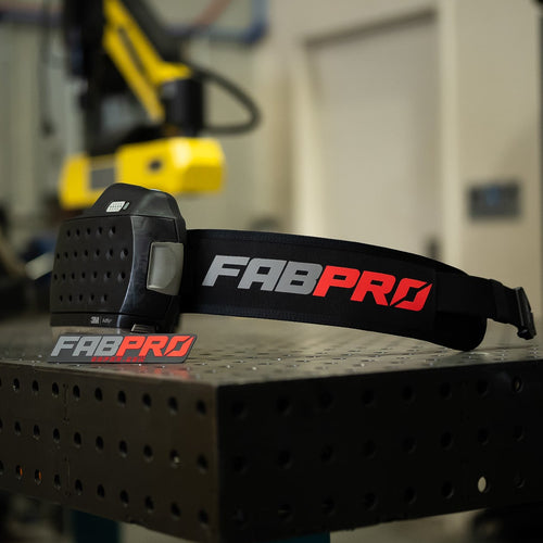 Fabpro Welding Belt with PAPR unit mounted, on a welding table