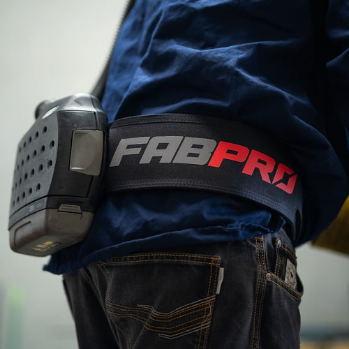 Welder wearing the Fabpro Welding Belt with a 3M Adflo PAPR unit on the hip