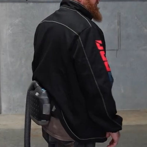 Side view of the Fabpro Welding Jacket with the PAPR unit clear of the hem